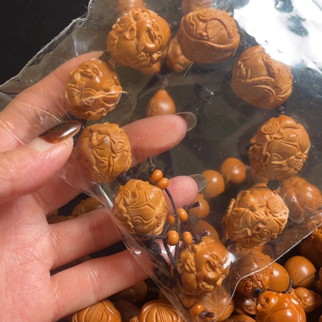 种***️吊坠橄榄核荷叶财神