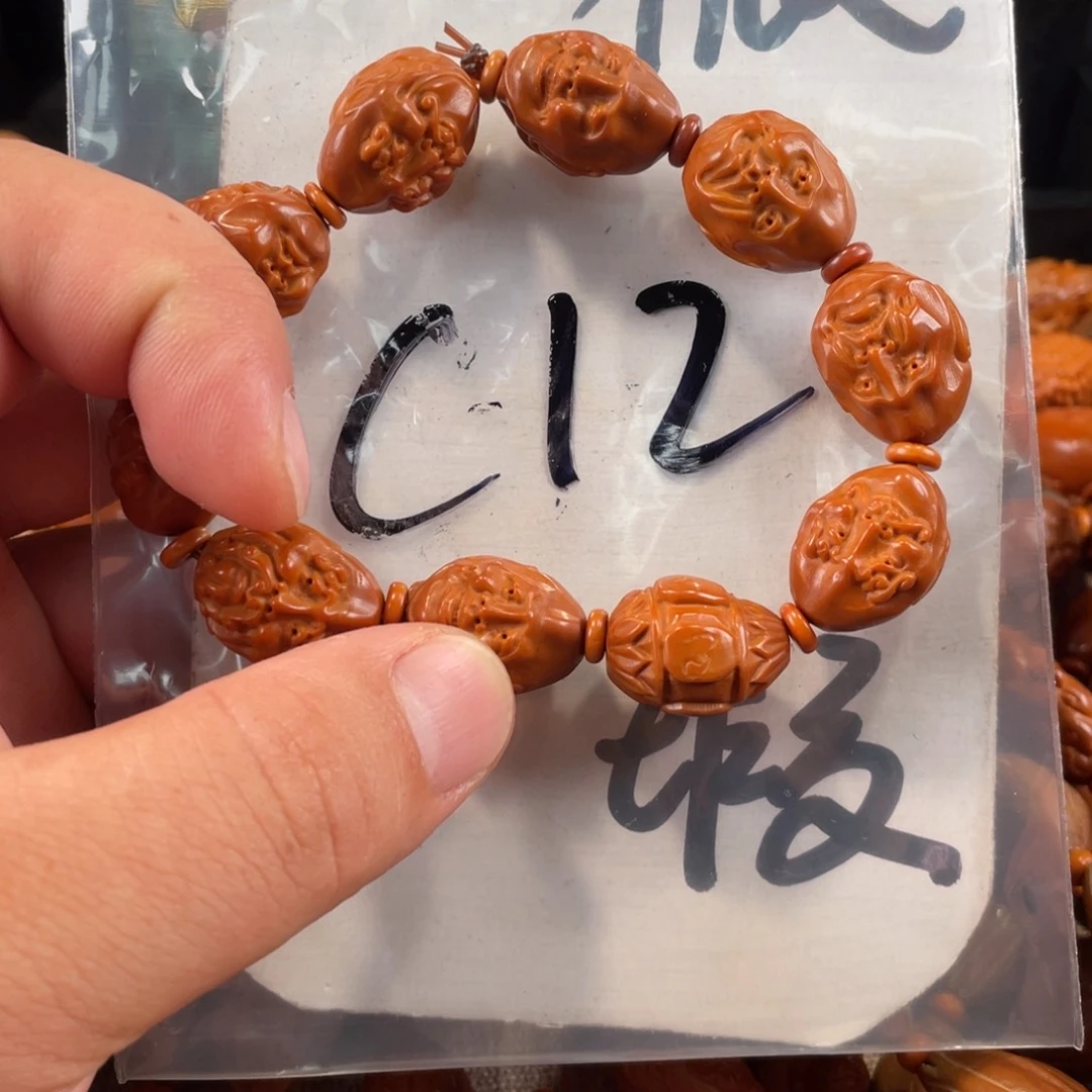 橄榄核其他橄榄核雕工艺手串 瑕疵介意勿拍