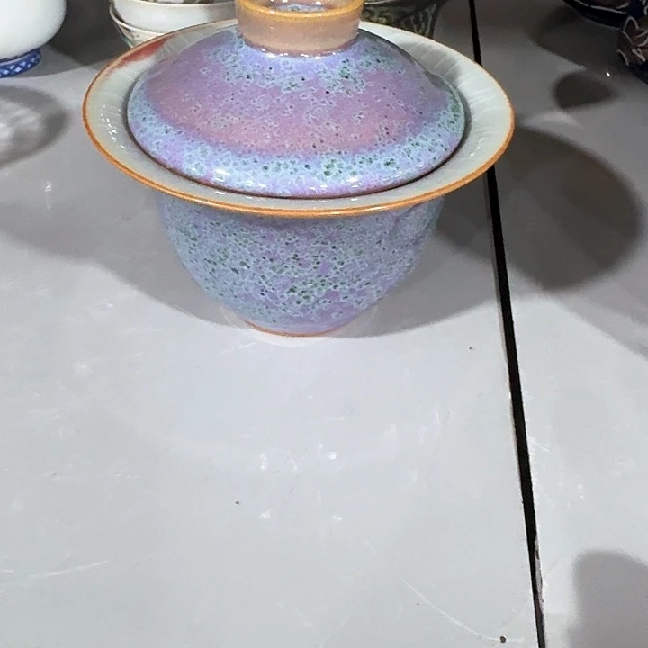 主人杯一个，瓷。。品茗