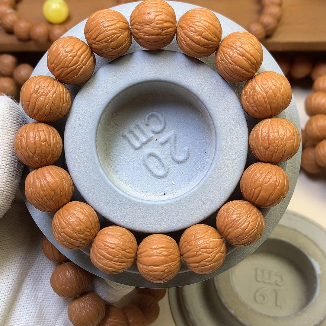 吊坠猴头核桃16凤羽手串