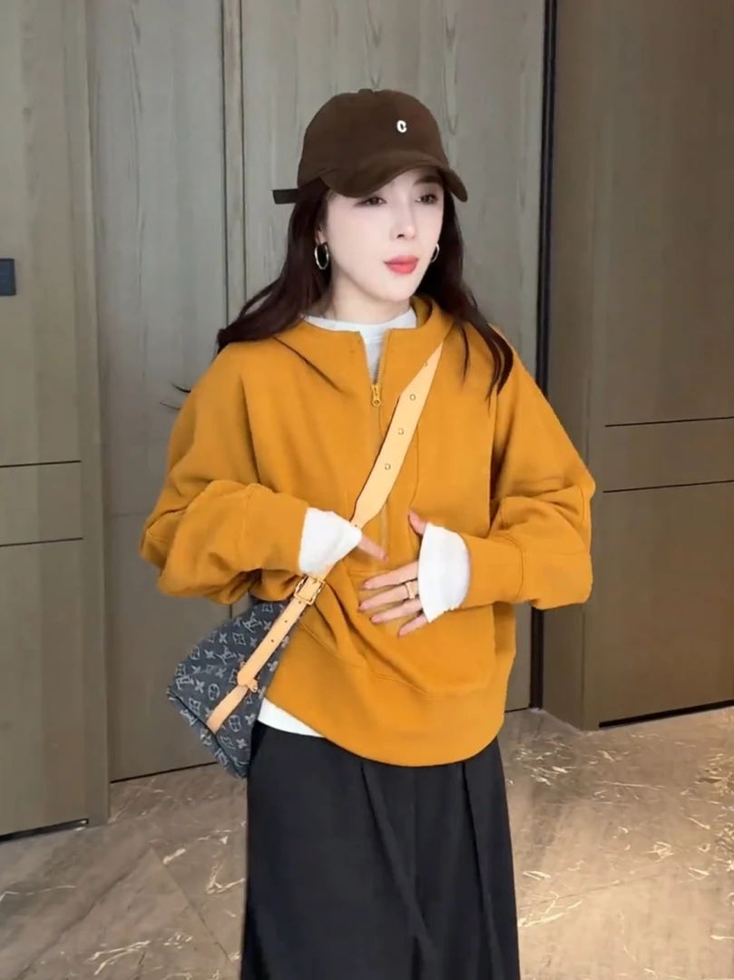 卫衣女2025春秋新款欧韩货设计高级感拼接网红连帽半开领上衣