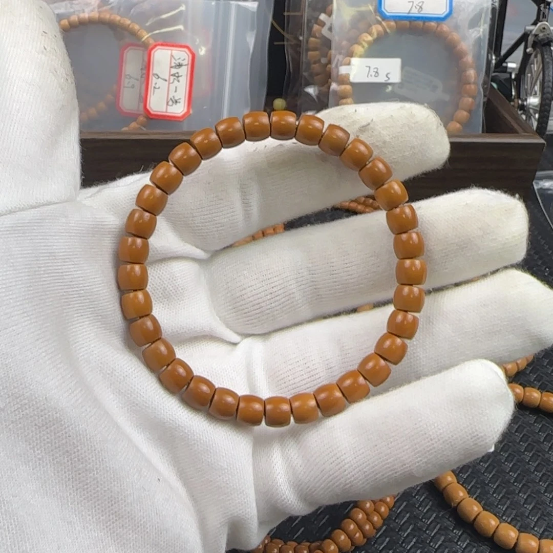 橄榄核吊坠寻****向7.2mm老挝核尖直切单圈