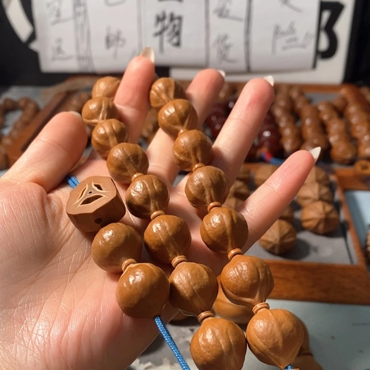 手串橄榄核9161精品蒜头铁核16+2颗