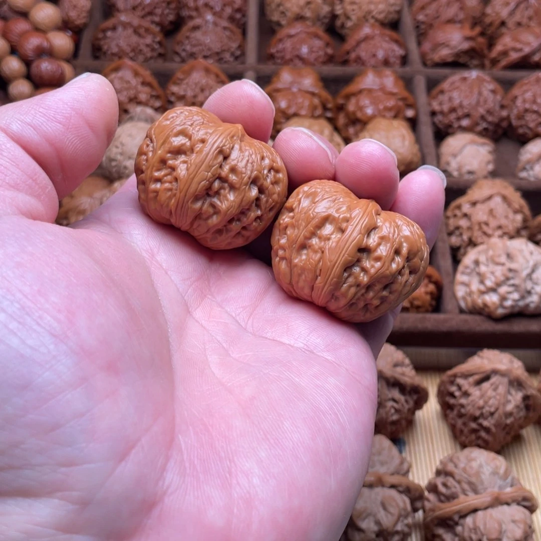 文玩核桃把件M**。平谷元宝