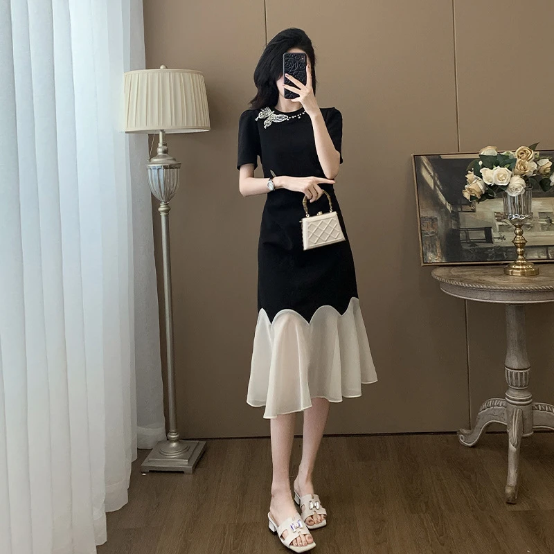 高级感法式气质绝美小黑裙女夏季撞色拼接显瘦荷叶边鱼尾过膝长裙