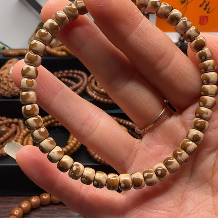 紫金鼠手串6*4.5纯肉短轴花鼠手串