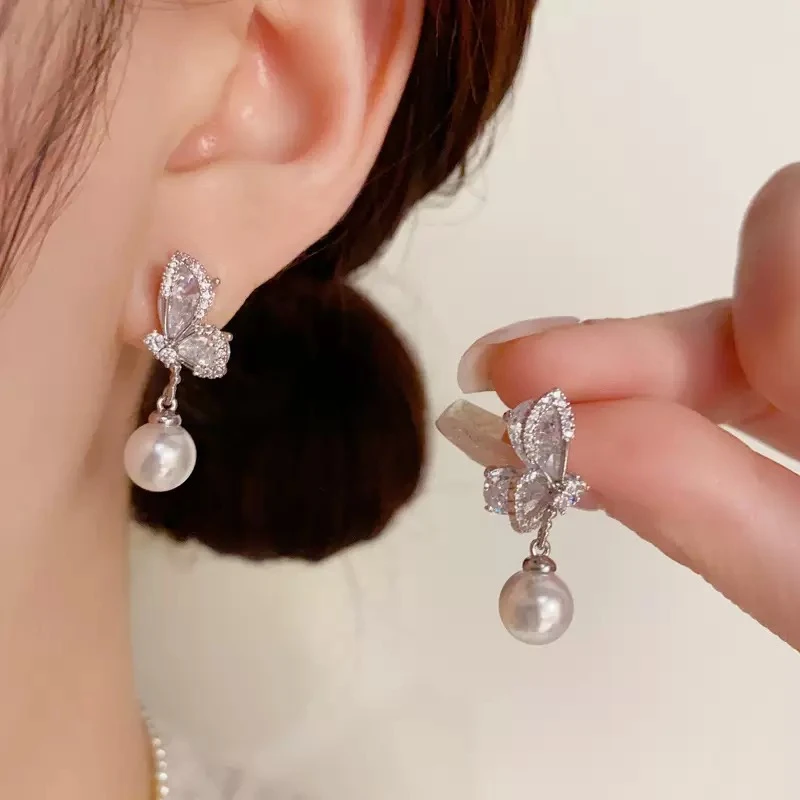 铜合金耳饰 法式小众设计感蝴蝶珠珠耳坠气质时尚高级耳环F1642
