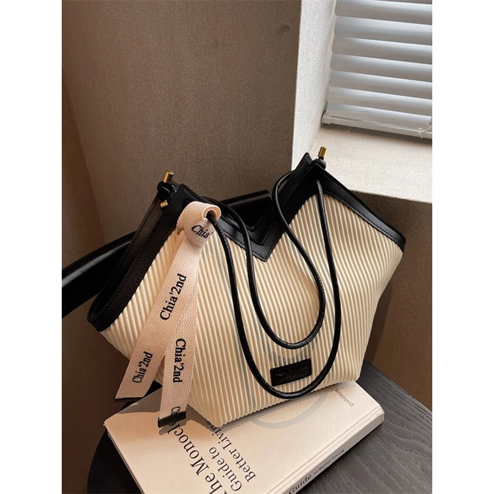 奥特莱斯【撤柜】大容量包包女2025新款春夏高级感通勤上班单肩挎包