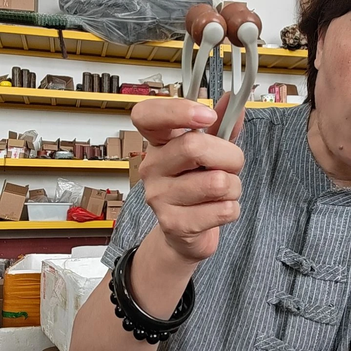 泗水砭石文化馆手指按摩手把件