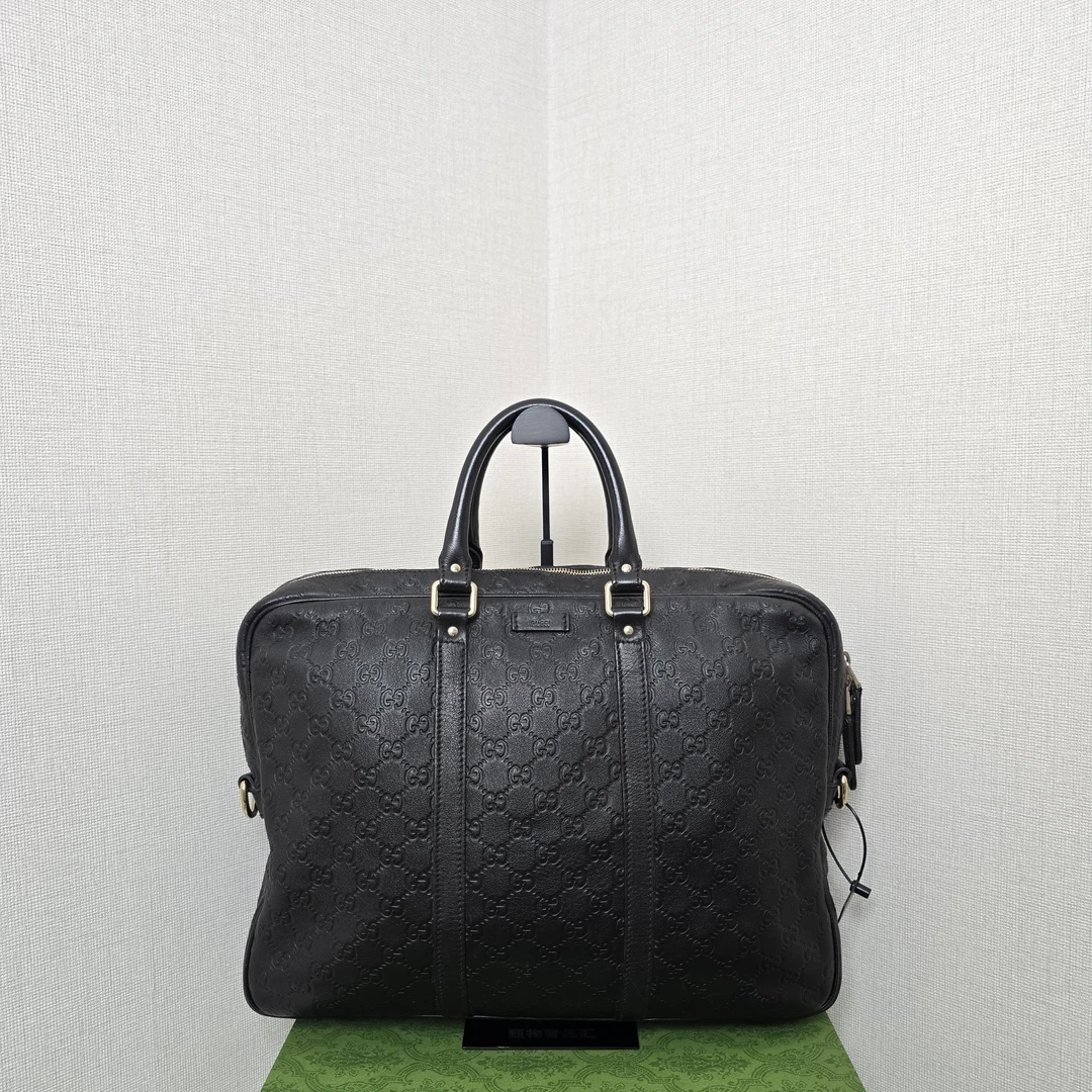 99新 GUCCI/古驰 98新高公价皮压花手提包 坤