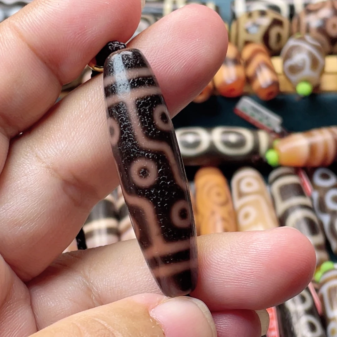 柚***皮玛瑙/玉髓未镶嵌颈饰曲贡九