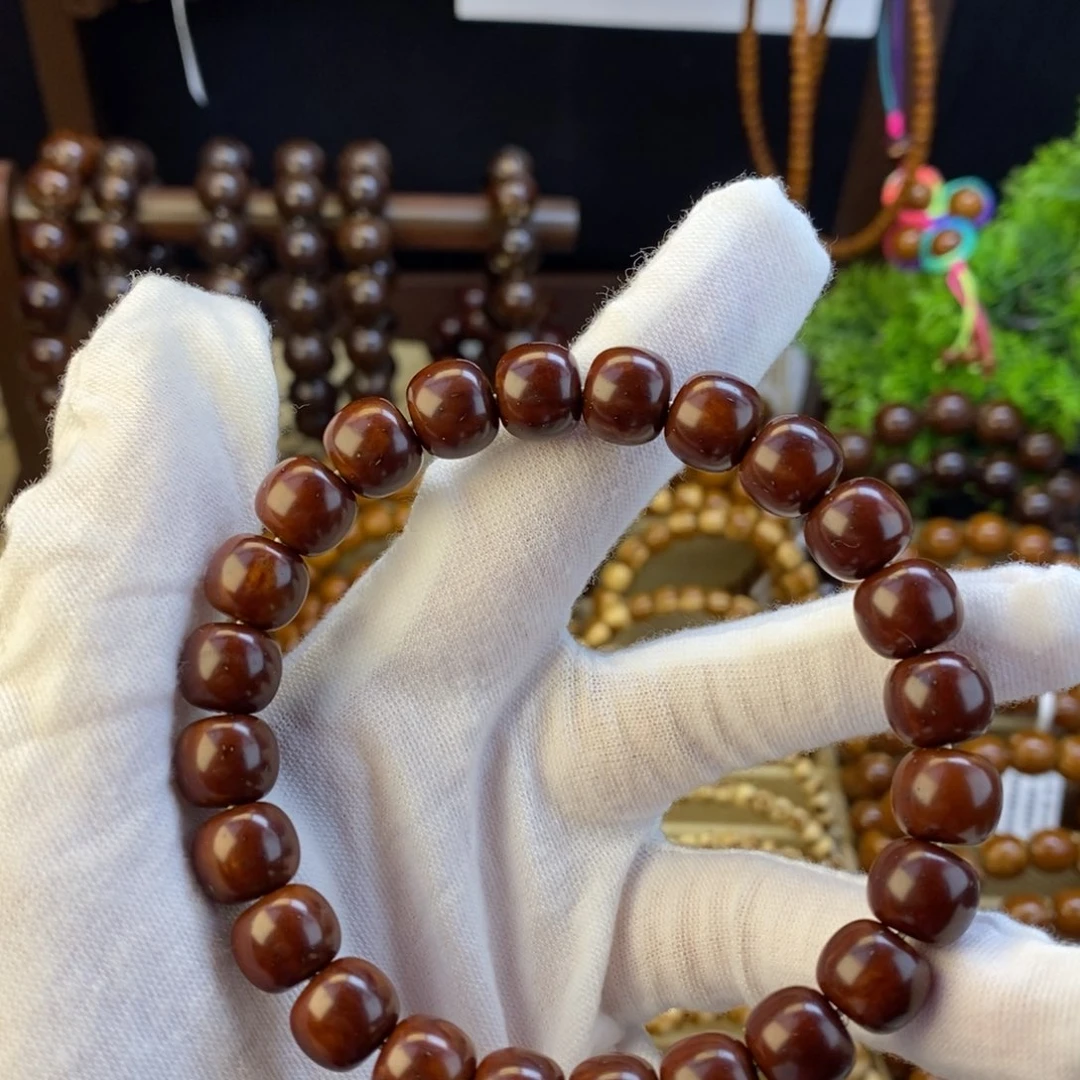 ە***来紫金鼠手串实心10.6