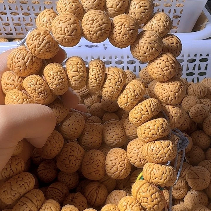 桃核吊坠小*呀桃核手串