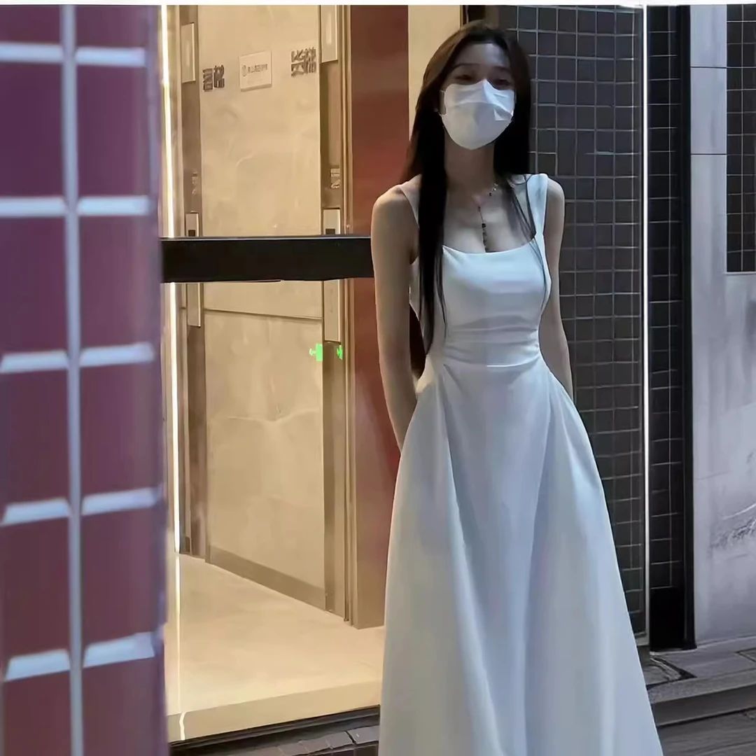 白色吊带连衣裙子女2025夏季新款法式茶歇小个子初恋收腰a字长裙