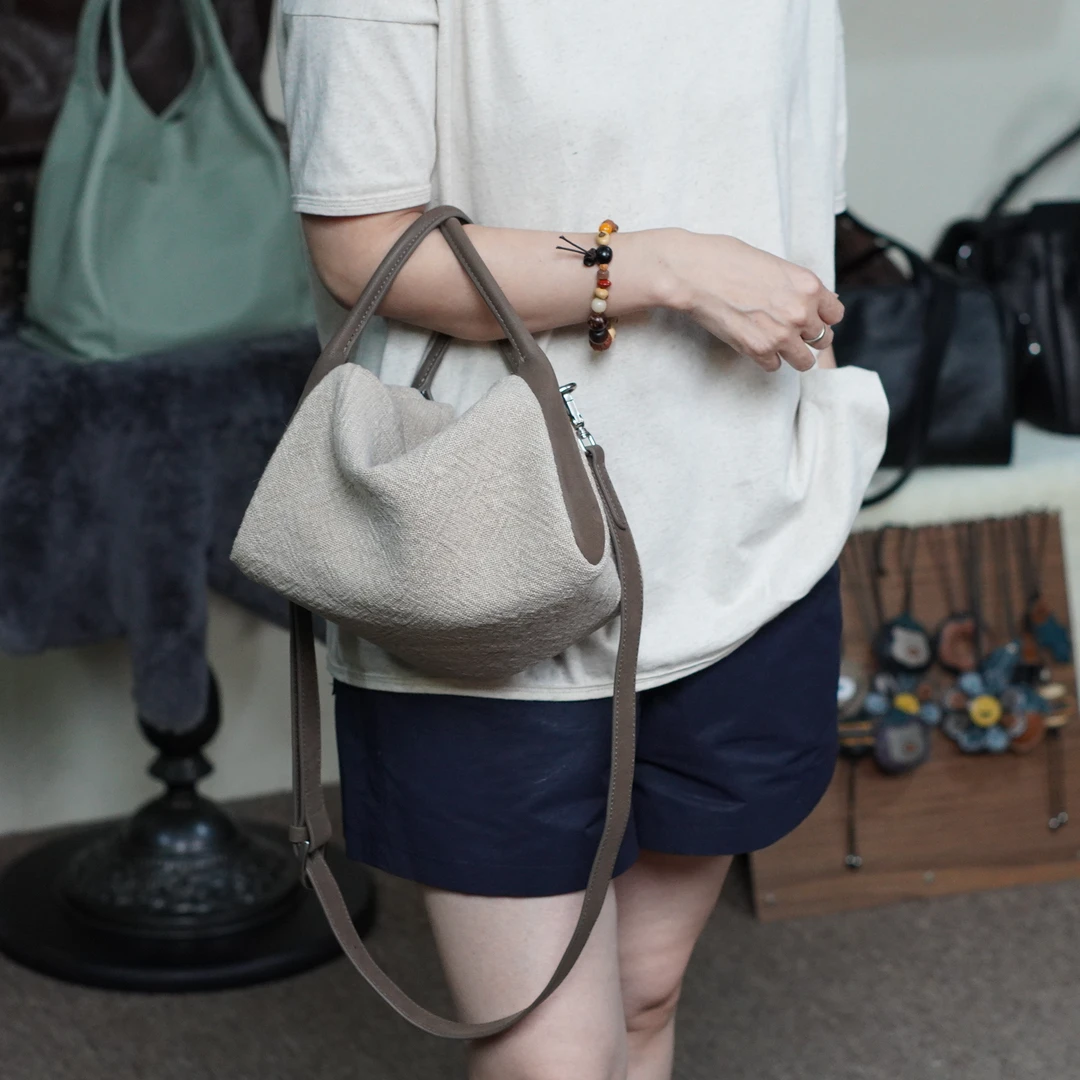 [冰语]2025新款真皮女包复古文艺苎麻配头层牛皮手腕手提包250629