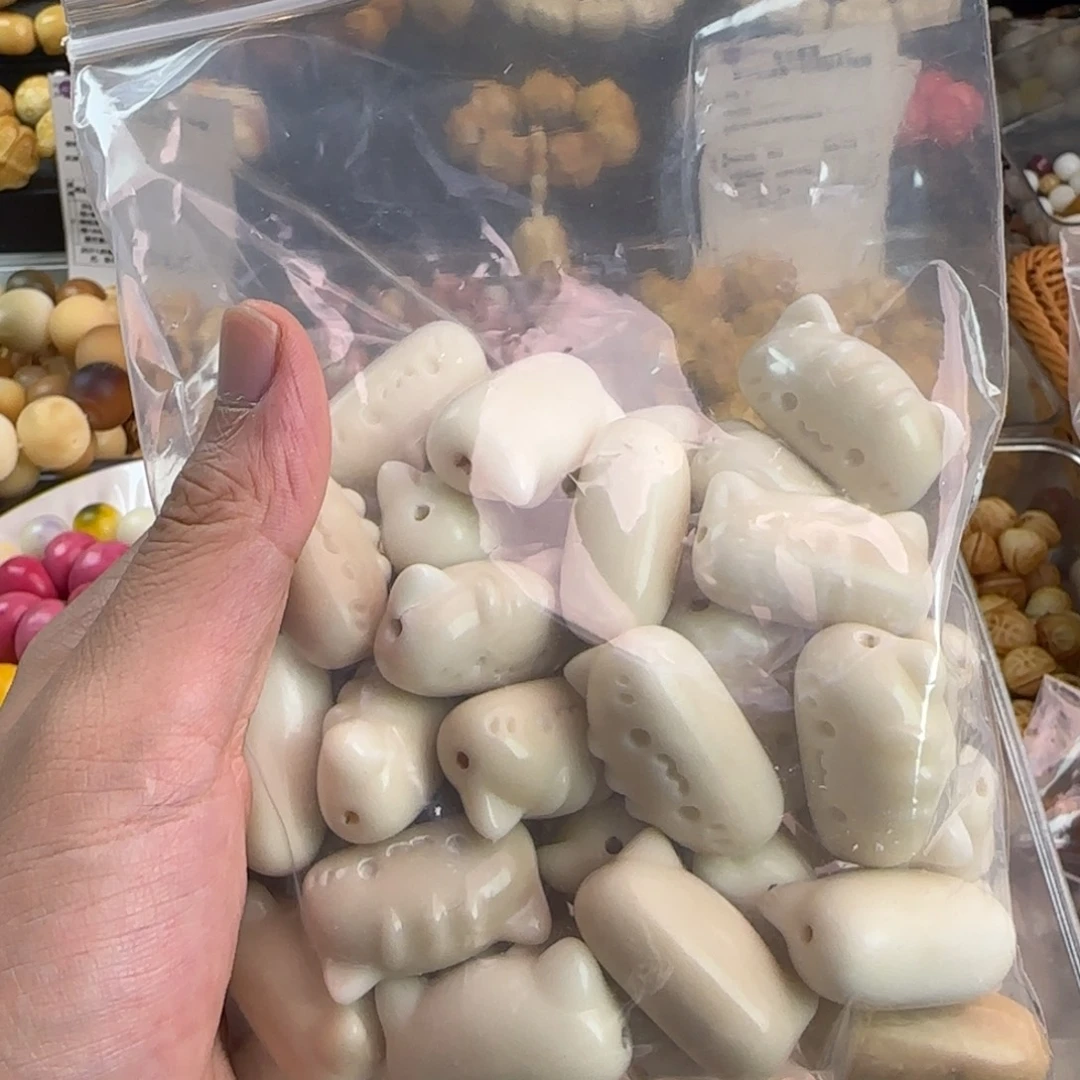 咕***咕吊坠菩提根/象牙果瑕疵37颗长条猫