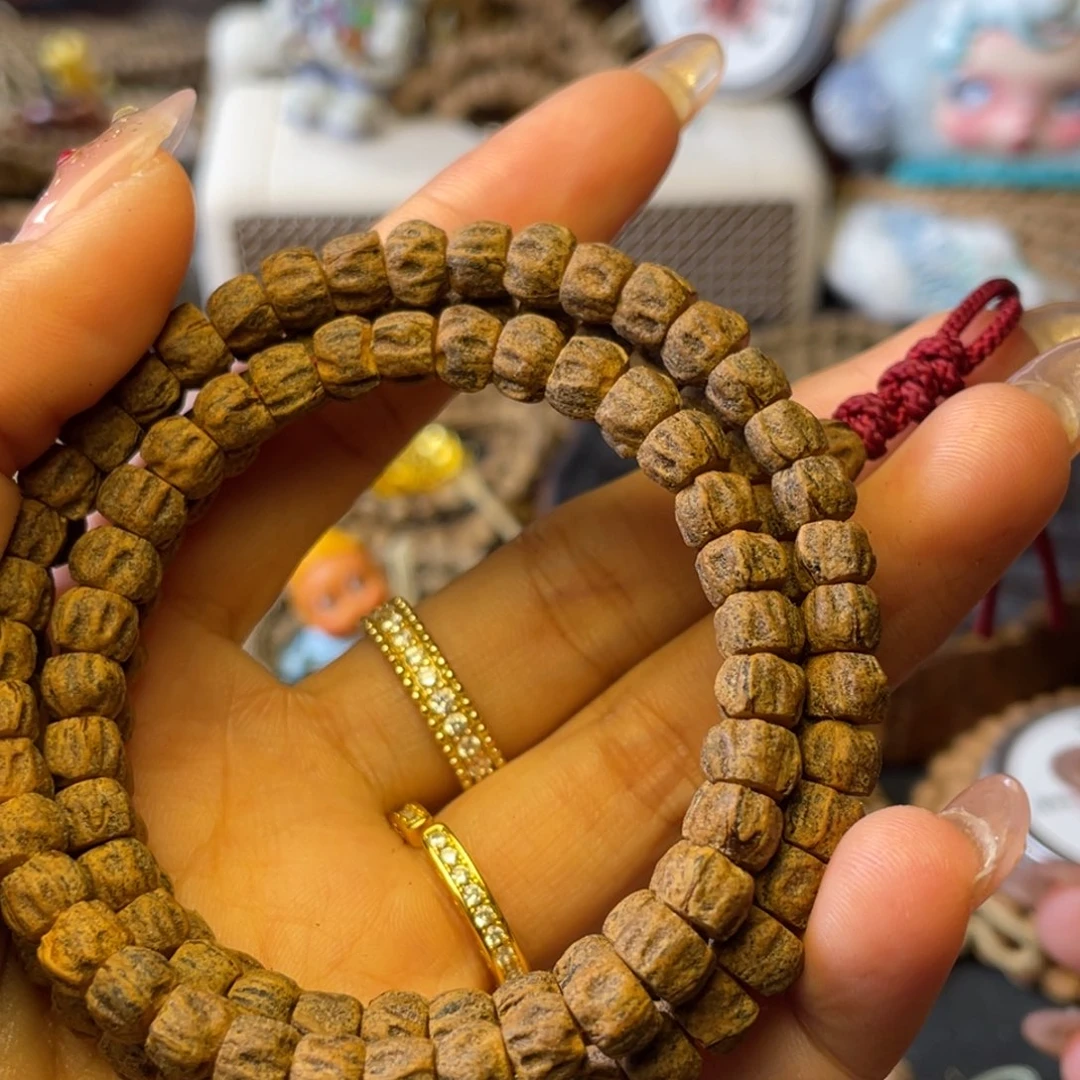 那***是吊坠柏香籽/百香籽