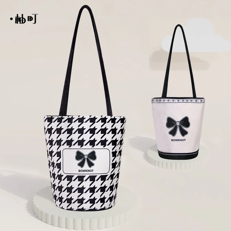 柚町x千鸟格欧若风春季休闲文艺大容量通勤水桶包简约包百搭包