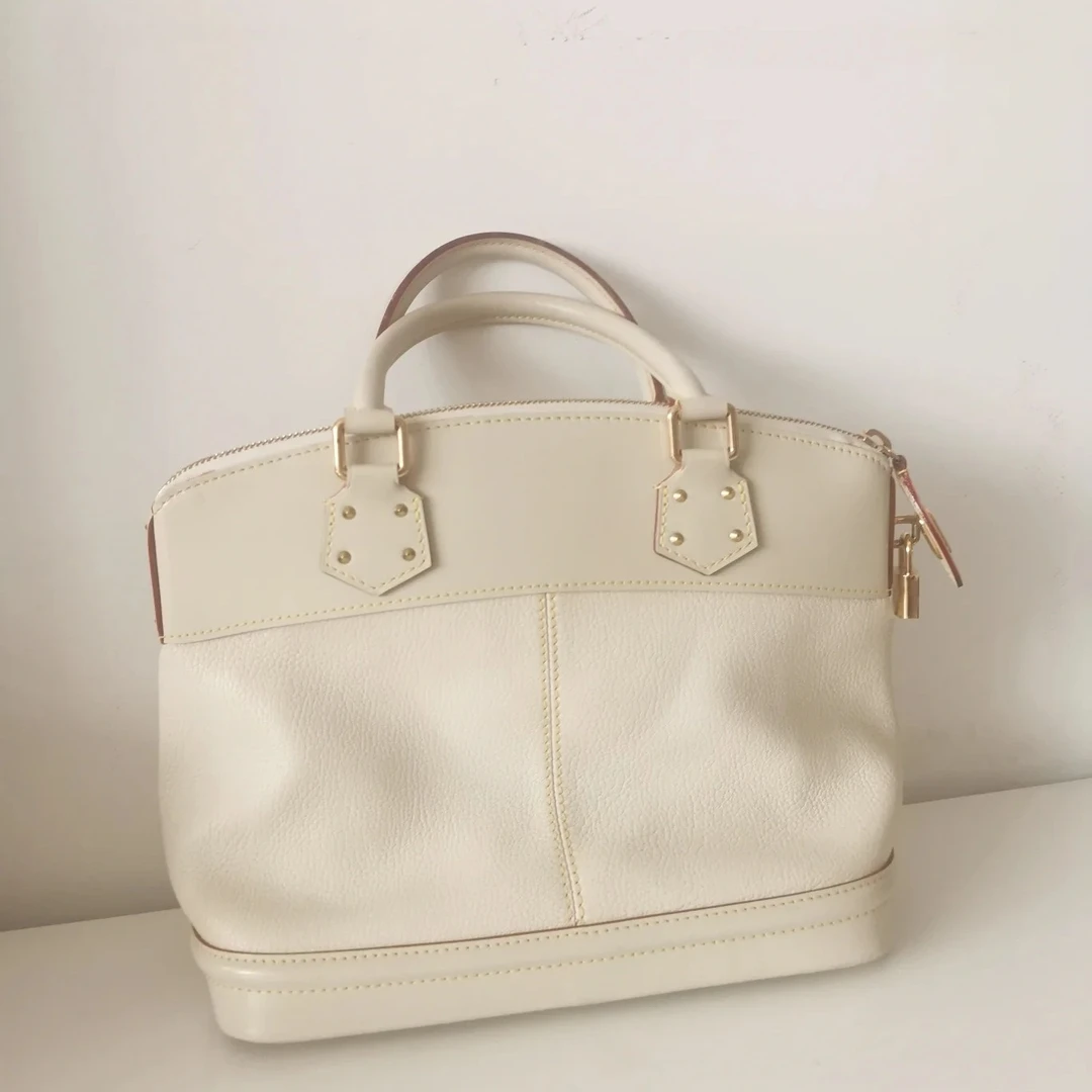 95新 LouisVuitton/路易威登 苏哈里手提贝壳包