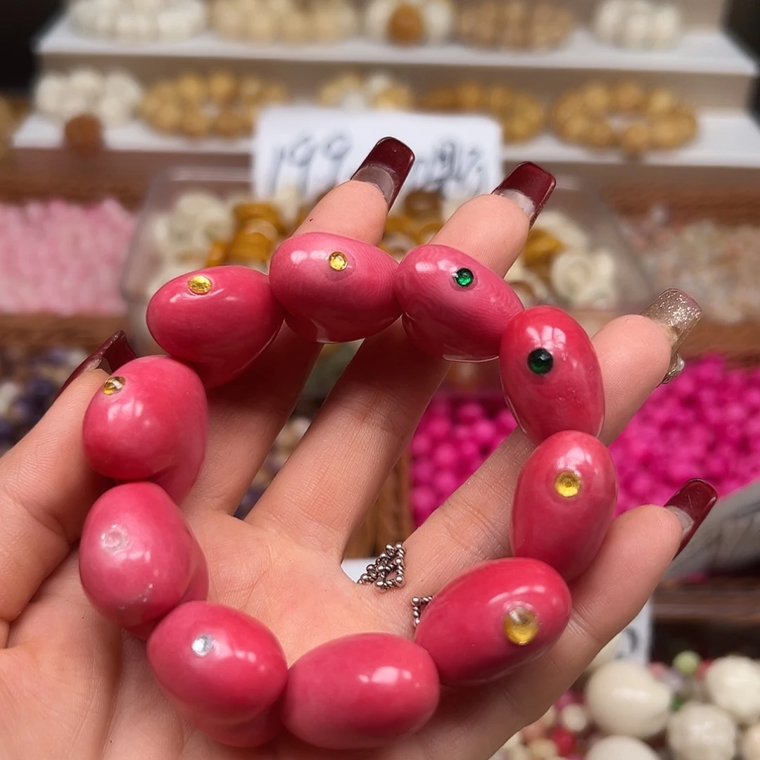 菩提根/象牙果手串微瑕粉爱心1条表面有裂有眼