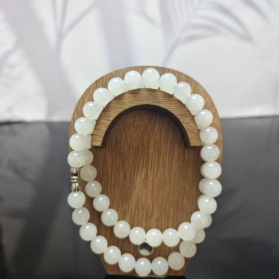 Q和田玉烟紫圆珠项链（卡8）1174