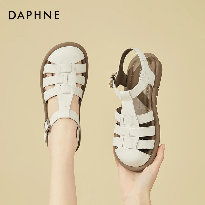 达芙妮包头罗马凉鞋女2025夏新款透气平底百搭镂空编织猪笼鞋外穿