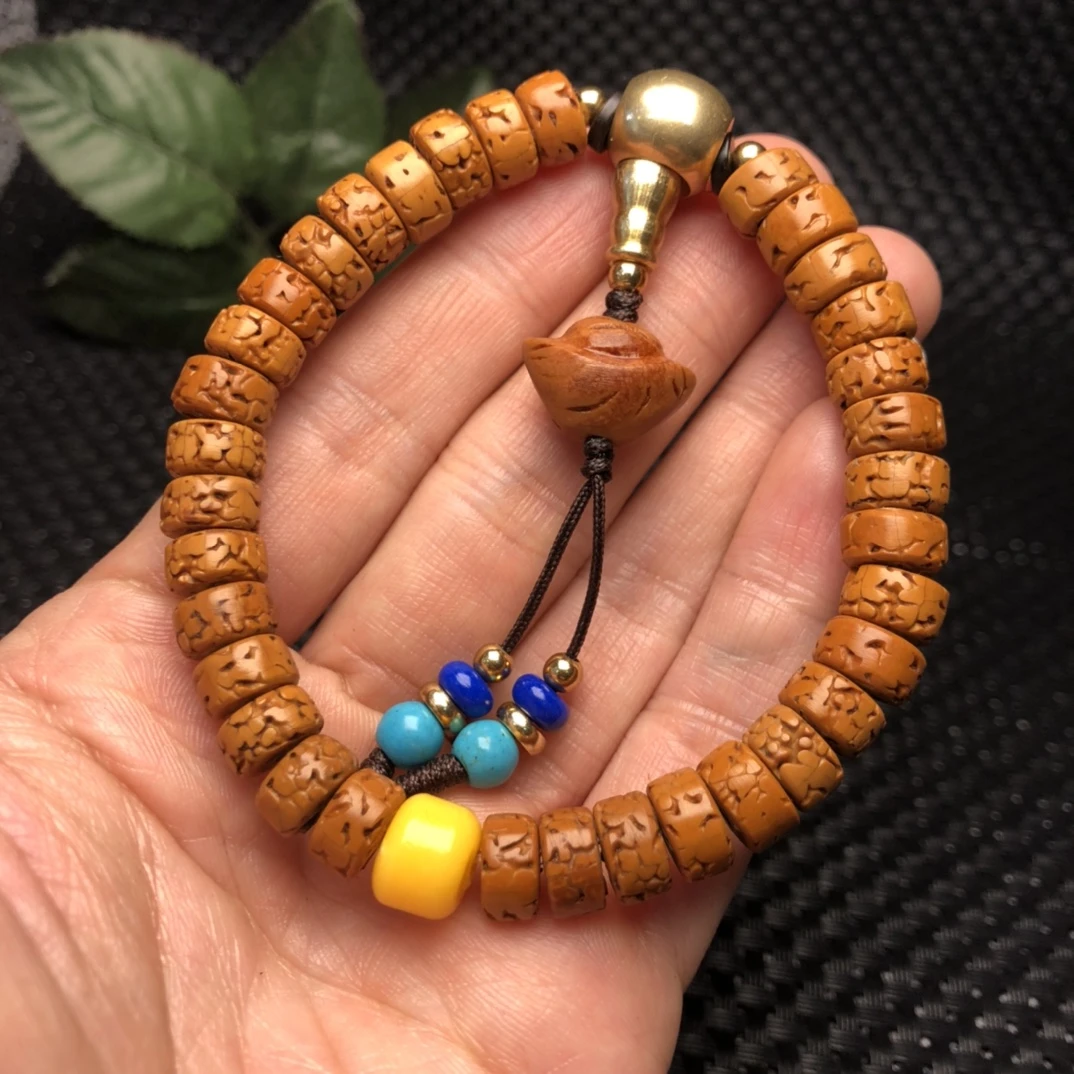 尼泊尔五瓣小金刚手串精工打磨药片老油籽打磨油性好文玩（盘玩袋）