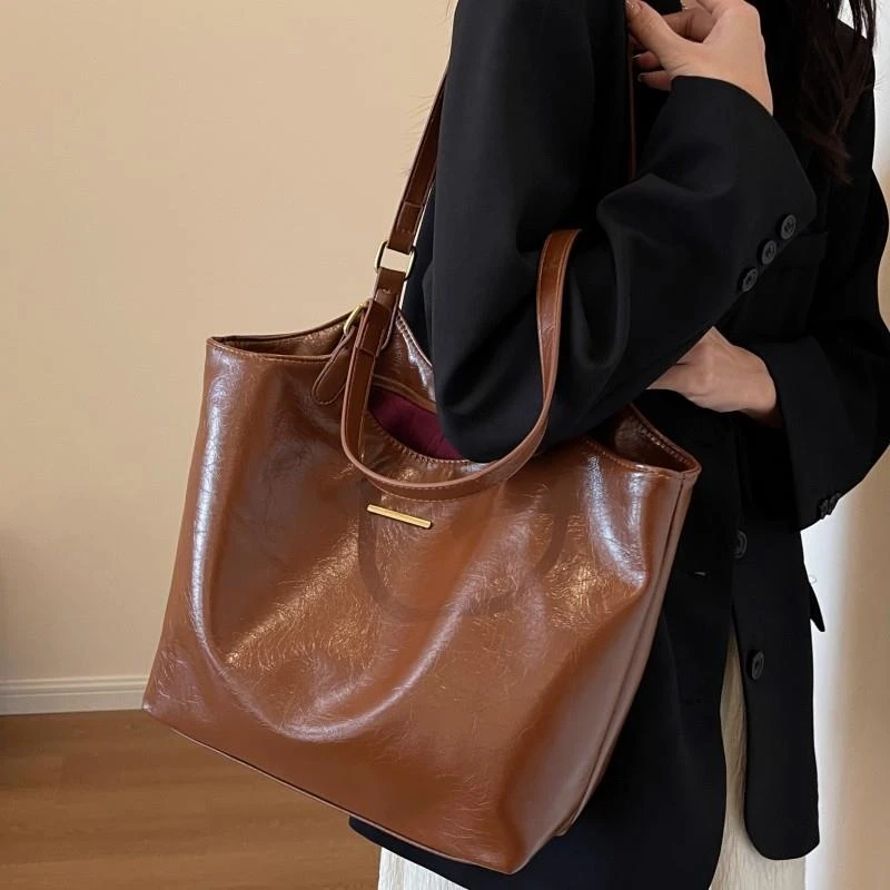 高级感大包包2024新款潮轻奢女包单肩包大容量通勤百搭手拎托特包