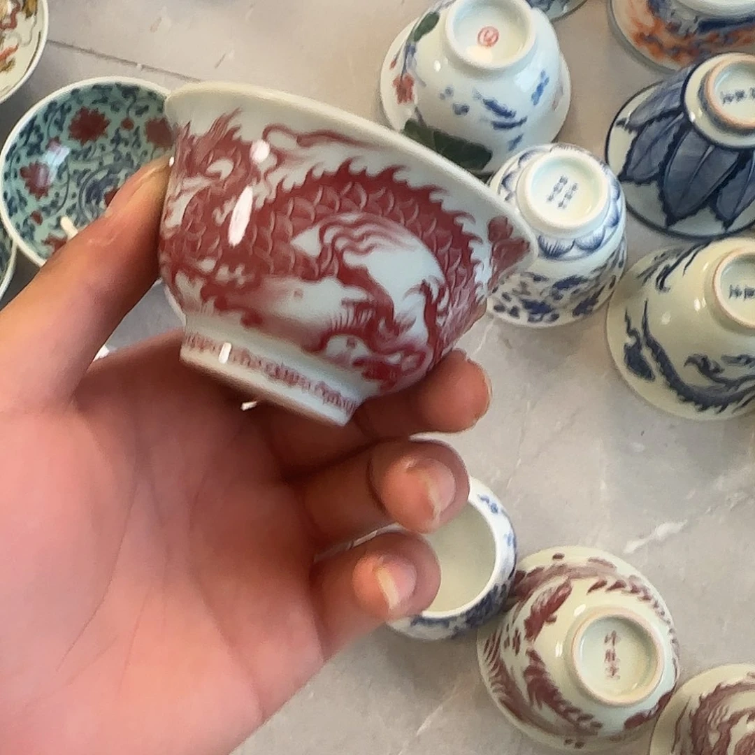 瓷片忍***理景德镇釉里红铠甲龙压手主人杯
