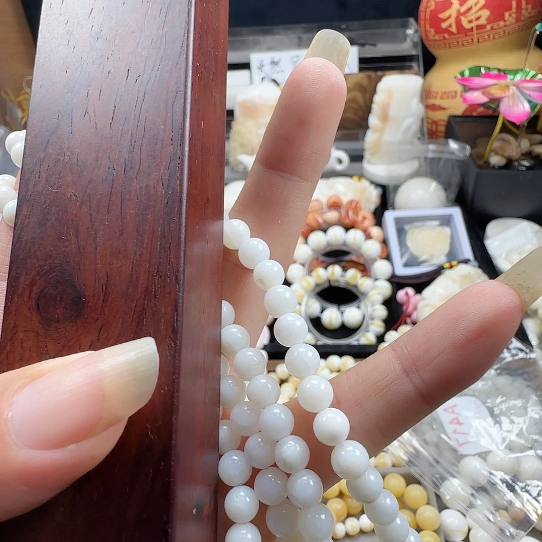 大果紫檀（缅甸花梨）0.6玉化带瑕108颗