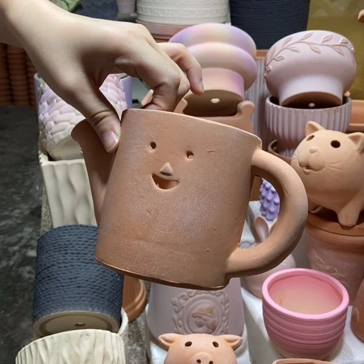 17×10红陶笑脸水壶花盆 粗陶1个