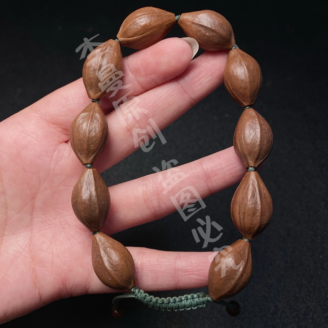 橄榄核精品铁核素串1.3小籽原皮素核爆红老料文玩手链盘完手串