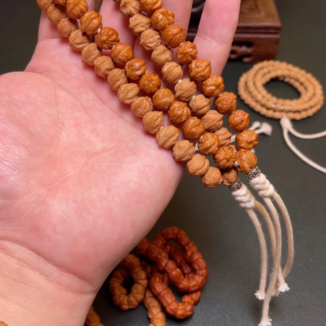 柏香籽/百香籽吊坠白牙手持