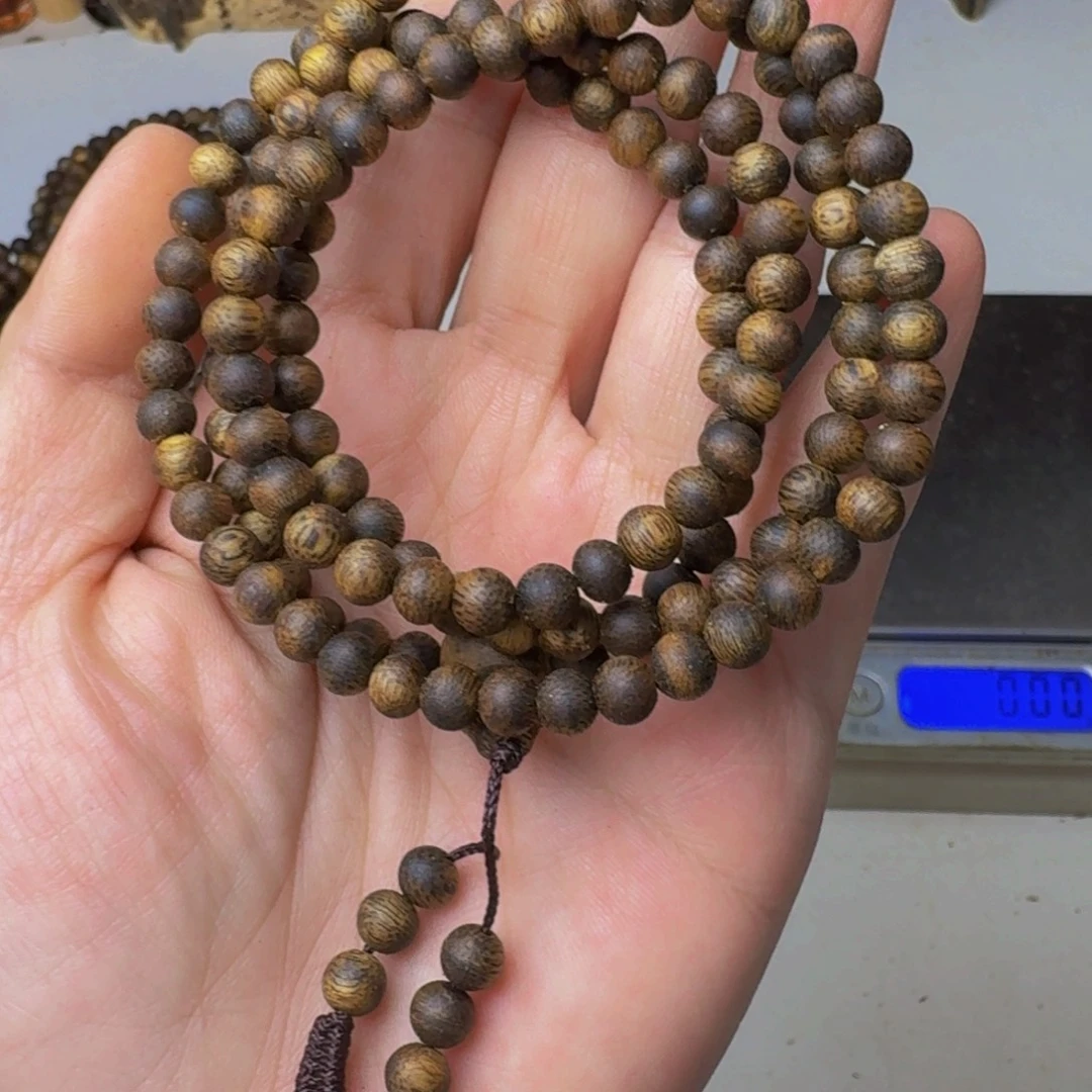 沉香沉香碎屑黑棋99沉0.5，9.4克