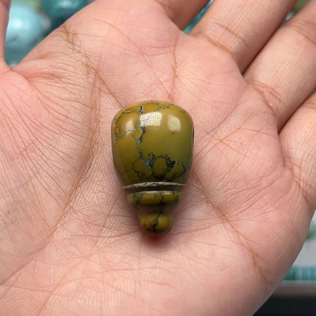 莫***昔未镶嵌绿松石珠宝奇石