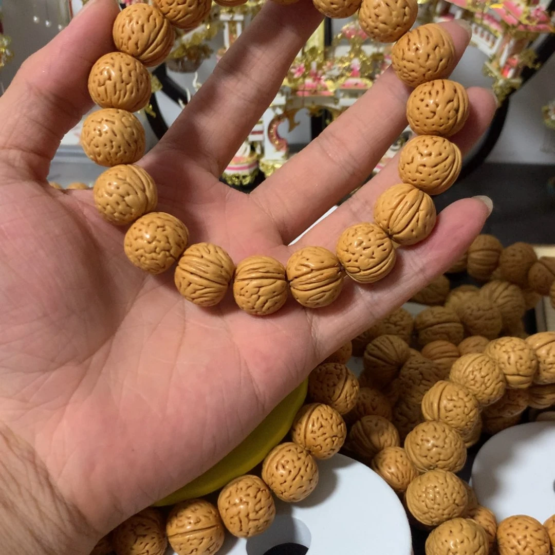 把***完精品桃核无双手串
