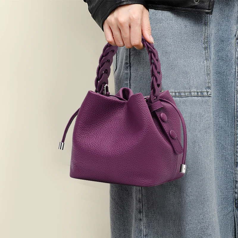 抽绳手提包女2025新款小众设计感紫色软皮单肩包通勤百搭