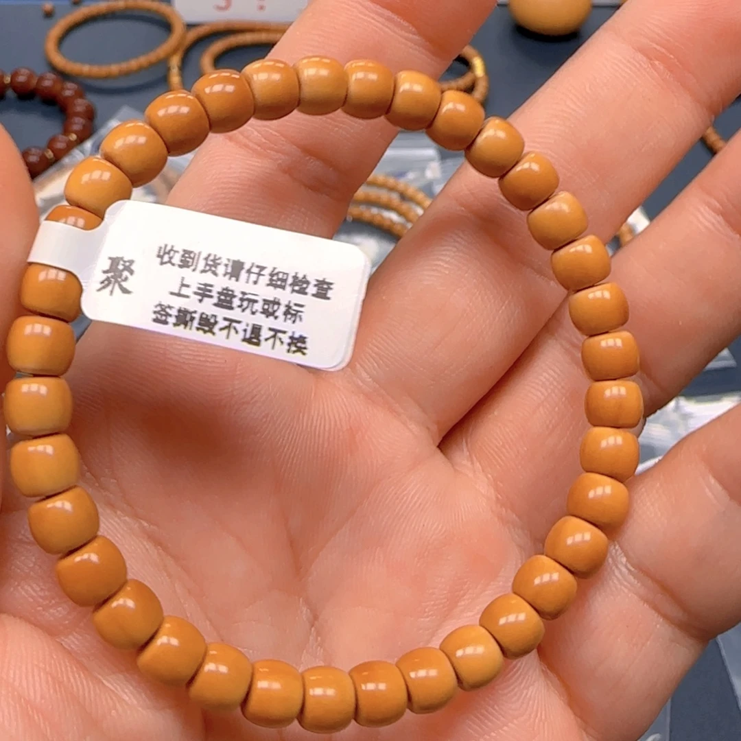 隔***王手串橄榄核老挝SS级核尖极限弧尺寸6.3