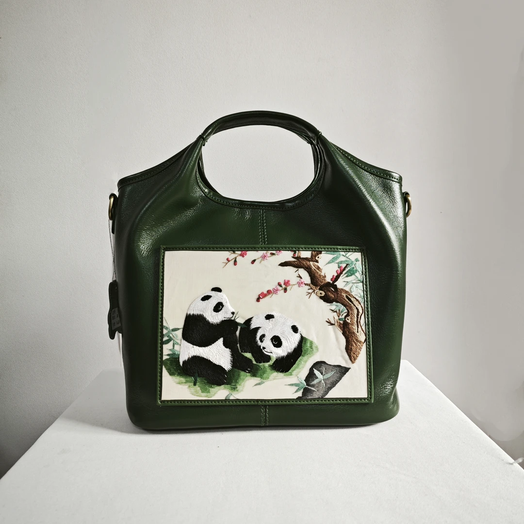 民族风熊猫手提斜跨单肩牛皮包包