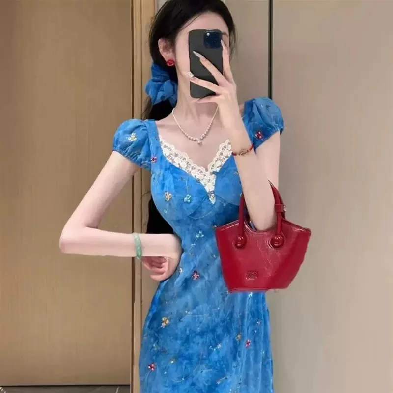 【张开心】雅乔卡普里蓝调带胸垫雪纺修身绣花短袖荷叶边连衣长裙