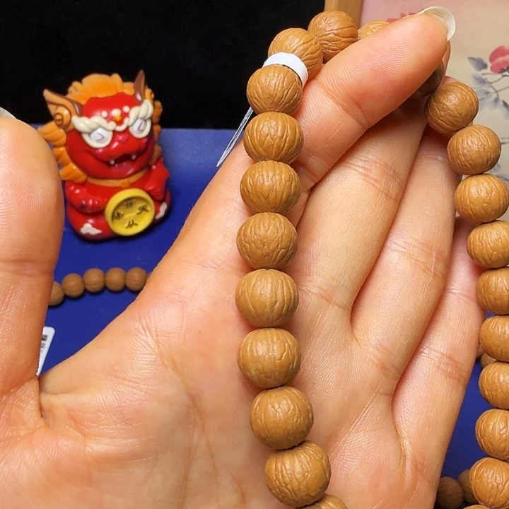 放***羁吊坠猴头核桃凤羽