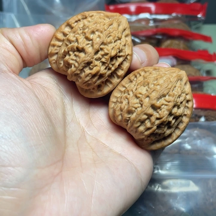 文玩核桃把件40金牛