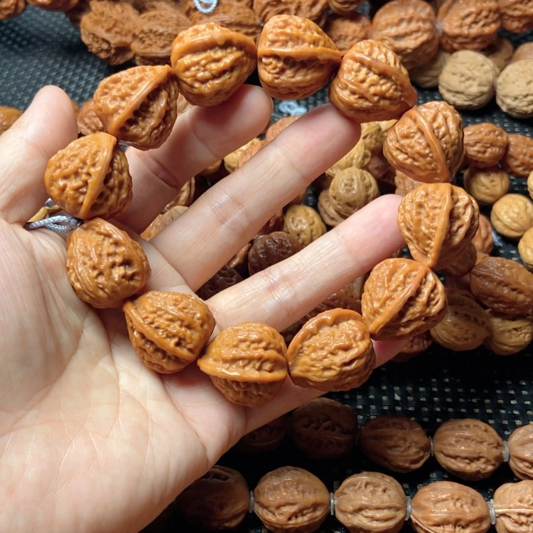 张***升桃核手串粗筋蚂蚁王