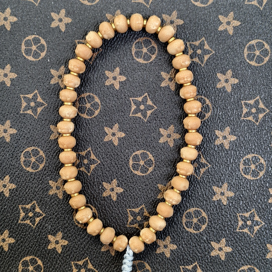 【D5146】龙脊菩提“宝宝佛”8.5mm左右手持料质油润