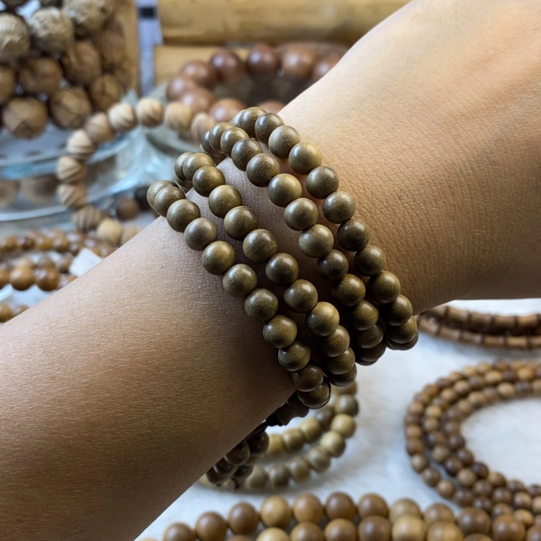 檀香木手串/手链奶香正区0.6/108（孔道不规整）