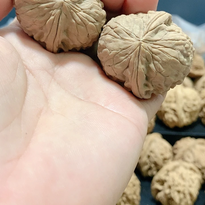 文玩核桃吊坠G**道金蟾樽白尖