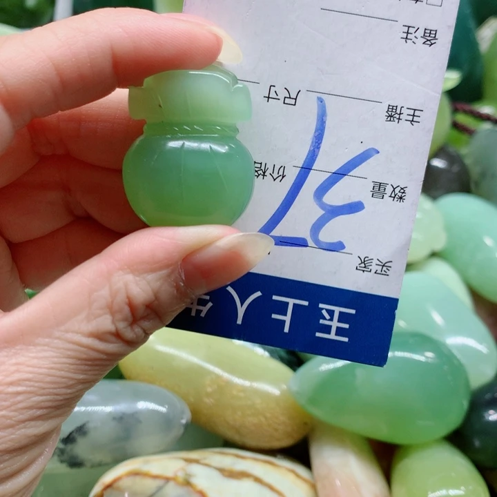 水***间蛇纹石玉未镶嵌手把件
