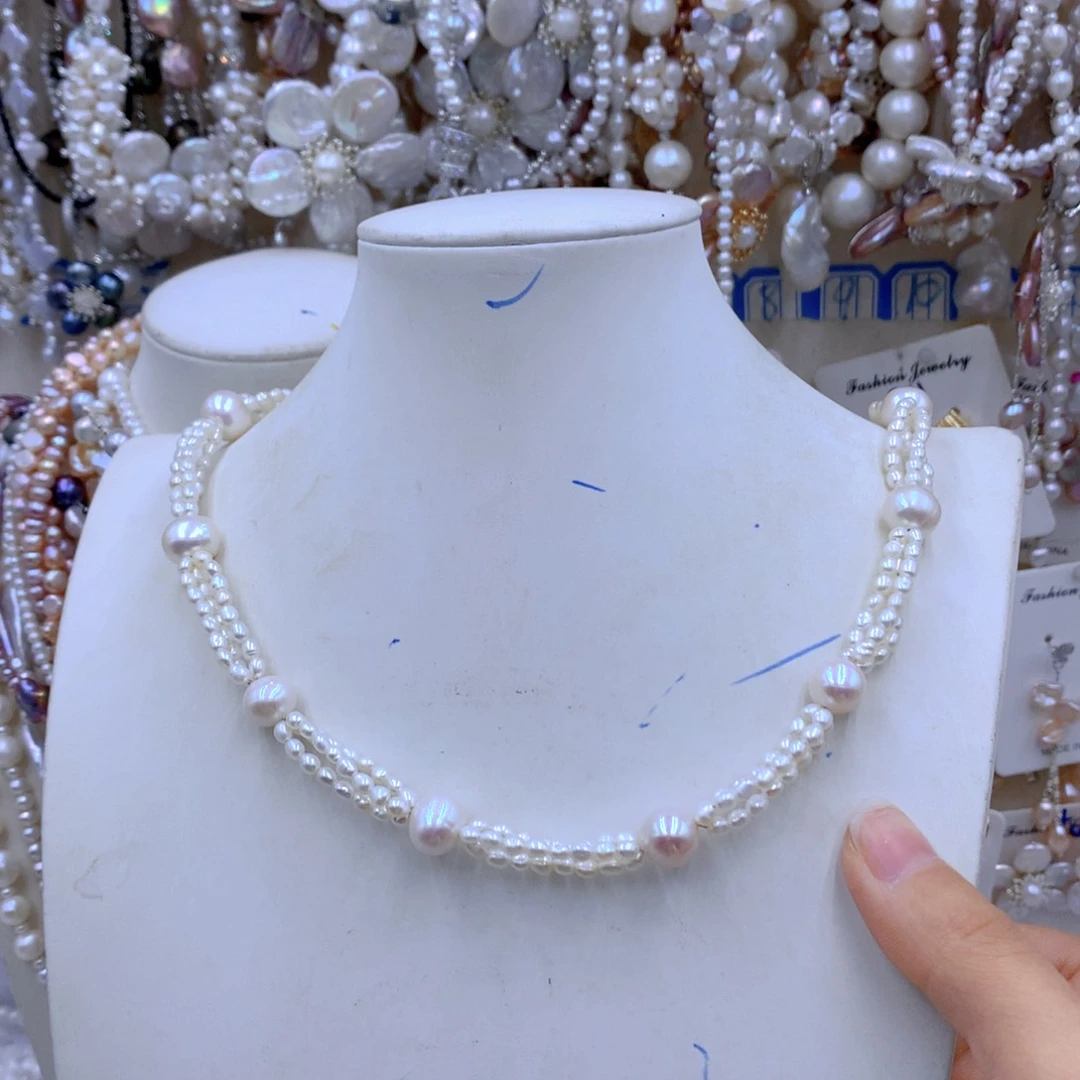 淡水珍珠耳饰银S925镶嵌每****鱼