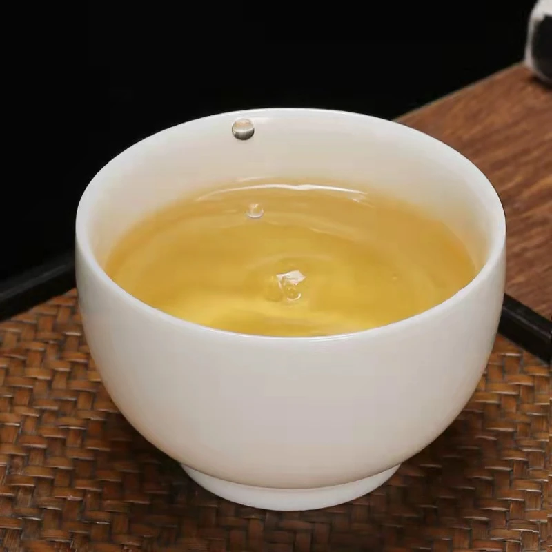 2002年红印铁饼  普洱生茶 357克