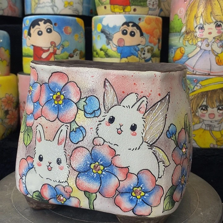 陶秒杀.精工手绘粉蓝对兔花盆